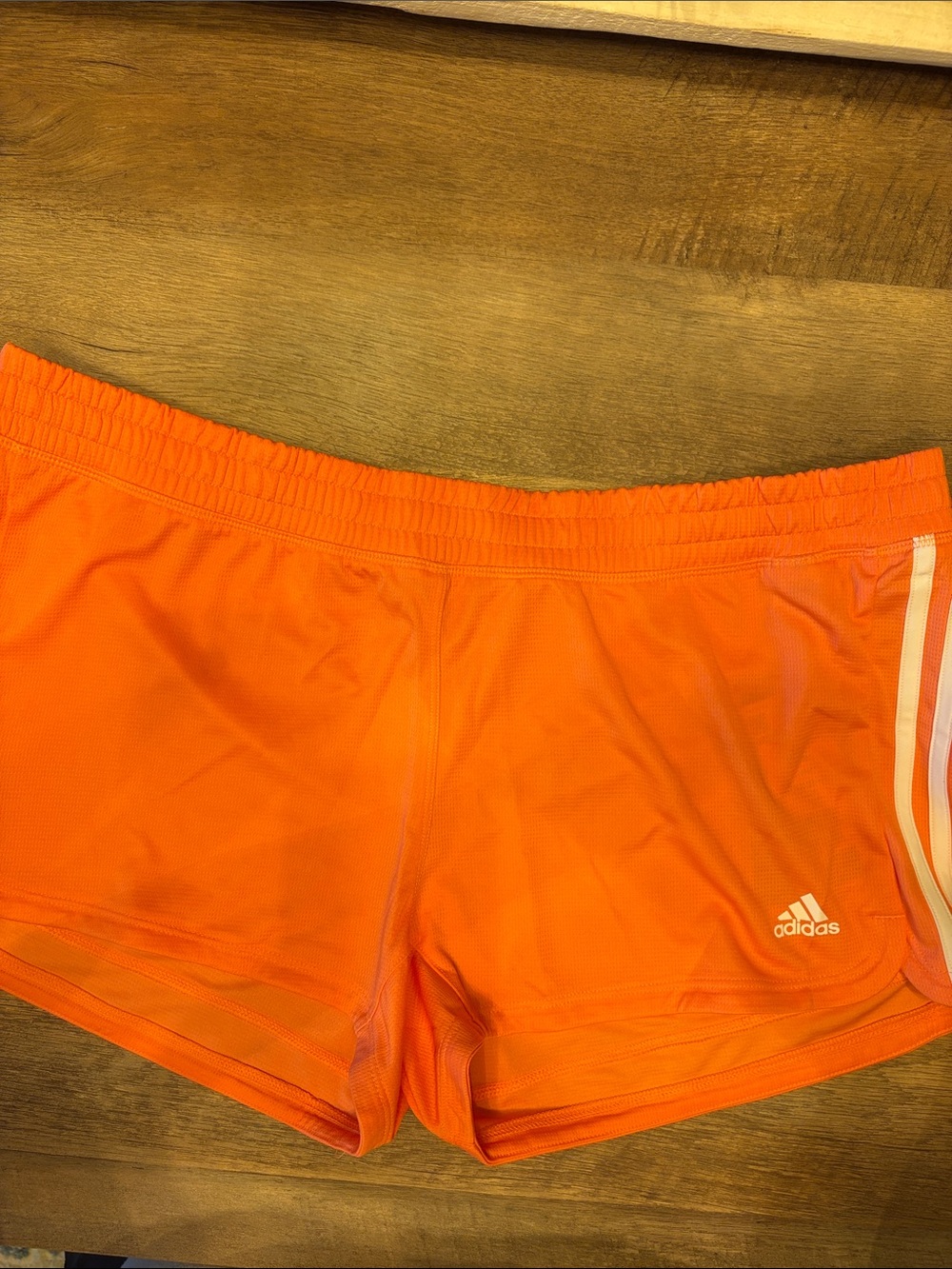 adidas Women’s Bright Orange Athletic Shorts with Side Stripes